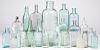 Group of colorless glass medical bottles, etc.