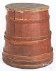 Large red painted barrel