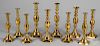 Full set of English brass candlesticks