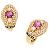 A ruby, diamond and sapphire 18K yellow gold pair of earrings.