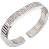 A diamond titanium and 18K white gold cuff bracelet.