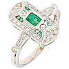An emerald and diamond 18K white gold ring.