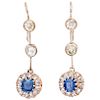 A sapphire and diamond 10K rose gold pair of earrings.