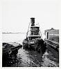 Five black and white tugboat photographs