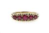 Ladies 14k Yellow Gold & Graduated Ruby Ring