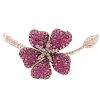 A Ladies Ruby and Diamond Brooch in 18K
