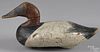 Carved and painted canvasback duck decoy, mid 20th c., attributed to R. Madison Mitchell, 15'' l.