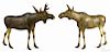 Pair of carved and painted bull and cow moose, ca. 1940, 13 1/4'' h., 16'' l.