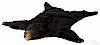 Taxidermy black bear rug, 65'' l.