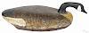 Carved and painted swimming Canada goose decoy, mid 20th c., having a cork over wood body