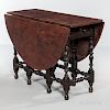 Dark Brown-painted and Paint-decorated Oval-top Gate-leg Table