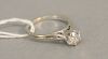 14K white gold ring set with center diamond, approx .80 cts.