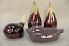Group of four eggplant form pieces to include Fitz and Floyd ironstone covered serving dish; Le Creuset covered enameled egg plant f...
