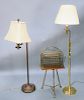Three piece lot to include adjustable brass floor lamps and brass magazine rack. Provenance: An Estate from 5th Avenue, New York