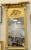 Federal gilt two part mirror with grape and leaf motif in upper section. 39 1/2" x 25".