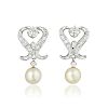 A Pair of Cultured Pearl and Diamond Earrings