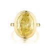 A 7.32-Carat Oval-Cut Fancy Yellow Diamond Ring