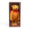 STEIFF BLOND BEAR WITH RED KNITTED BOW TIE