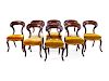 A Set of Eight Victorian Balloon Back Side Chairs