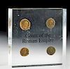 Lot of 4 Roman Bronze Coins Displayed Together