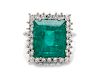 A White Gold, Emerald and Diamond Ring,