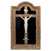 CHRIST CRUCIFIED. MEXICO, 19TH CENTURY. Carved ivory figure with wooden crucifix on a wooden and golden frame. 