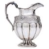 JUG. MEXICO, 20TH CENTURY. Silver. The body with repoussé with chased strapwork. Decorated with floral details. Double headed handle as a snake and a 