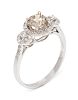 An 18 Karat White Gold, Colored Diamond and Diamond Ring,