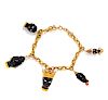 An 18 Karat Yellow Gold, Ebony and Enamel Blackamoor Charm Bracelet, Italian,