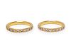A Pair of 14 Karat Yellow Gold and Diamond Rings,