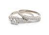 A 14 Karat White Gold and Diamond Ring Set, Rogers & Hollands,