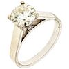 A diamond 14K white gold solitaire ring.