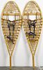 Pair of snowshoes, 20th c., 47'' l. Provenance: From the estate of Rodney Ness.
