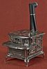 Cast iron and nickel Ruby 1893 toy stove, 8 1/2