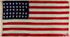 American flag, 1877-1890, with thirty-eight stars, stenciled on binding Patented April 26, 1870
