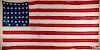 Very large American flag, 1877-1890, with thirty-eight stars, 134'' x 255''.