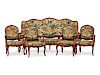 A Louis XV Style Tapestry-Upholstered Five-Piece Carved Walnut Salon Suite