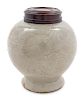 A Celadon Glazed Porcelain Incised Jar
Height 4 3/4 in., 12 cm