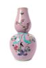 A Pink Ground Famille Rose Gourd-Form Vase
Height 16 1/2 in., 42 cm. 