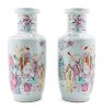 A Pair of Famille Rose Porcelain Rouleau Vases
Height 18 in., 46 cm. 