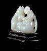A Pale Grey Jade 
Horse and Groom
 Group
Length 2 3/8 in., 6 cm. 