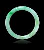 An Apple Green and Celadon Jadeite Bangle
 
Interior: 2 5/8 in., 7 cm. 