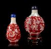 Two Red Overlay 'Snowflake' Ground Glass 'Chilong' Snuff Bottles
Larger: height 2 3/8 in., 6 cm. 