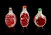 Three Red Overlay 'Snowflake' Ground Glass Snuff Bottles
Largest: 2 3/4 in., 7 cm. 