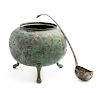 A Large and Rare Bronze Tripod Tureen and Ladle
Ladle: length 13 1/4 in., 34 cm., Tureen: height 8 1/2 x diam 9 in., 22 x 23 cm. 
