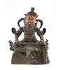 A Sino-Tibetan Parcel-Gilt Bronze Figure of Virudhaka
Height 6 in., 15 cm.