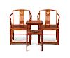 A Set of Huanghuali Armchairs and Side Table
Chair: height 38 x length 24 x width 18 1/2 in., 96.5 x 61 x 47 cm.