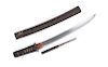 A Japanese Wakazashi
Blade length 13 1/2 in., 24 cm; Overall length 18 7/8 in., 48 cm.