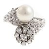 A Ladies Vintage Diamond & Pearl Ring in Platinum