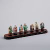 Los Siete Dioses de la Fortuna "Sichi Fukujin". Japón, SXX. Elaborados en porcelana policromada con base de madera laqueada.Pz:7